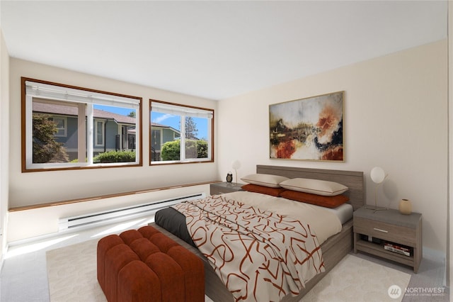 7581 Old Redmond Rd # 4, Redmond, WA 98052 - bedroom featuring a baseboard radiator and carpet flooring