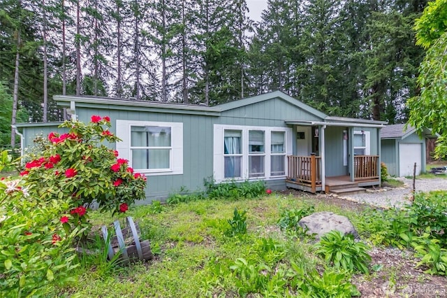 16016 11th Ave E, Tacoma, WA 98445 - view of front of property featuring a porch and a garage