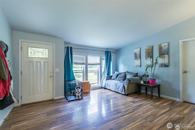 16016 11th Ave E, Tacoma, WA 98445 - entryway with wood finished floors, baseboards, and lofted ceiling
