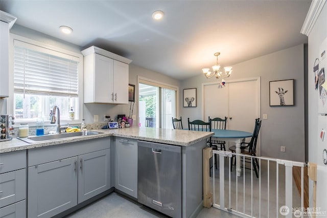 16016 11th Ave E, Tacoma, WA 98445 - kitchen featuring dishwasher, a sink, a chandelier, a peninsula, and pendant lighting