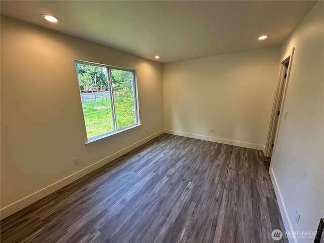 7041 E Washington St, Port Orchard, WA 98366 - unfurnished room with dark wood-style floors, baseboards, and recessed lighting