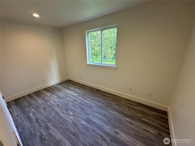 7041 E Washington St, Port Orchard, WA 98366 - empty room with baseboards, dark wood finished floors, and recessed lighting
