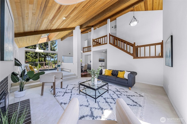 5030 155th Pl SE, Bellevue, WA 98006 - living room with a wood ceiling with exposed beams, high vaulted ceiling, and stairs