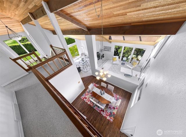 5030 155th Pl SE, Bellevue, WA 98006 - living room featuring a wood ceiling with exposed beams, plenty of natural light, wood finished floors, and stairway