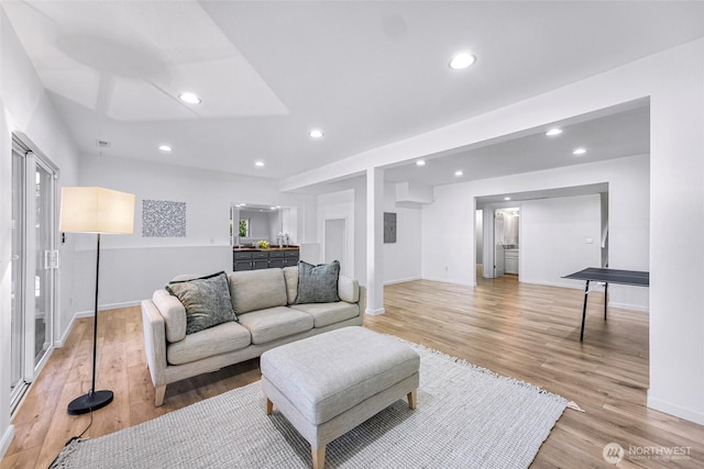 5030 155th Pl SE, Bellevue, WA 98006 - living area featuring light wood-style flooring and recessed lighting