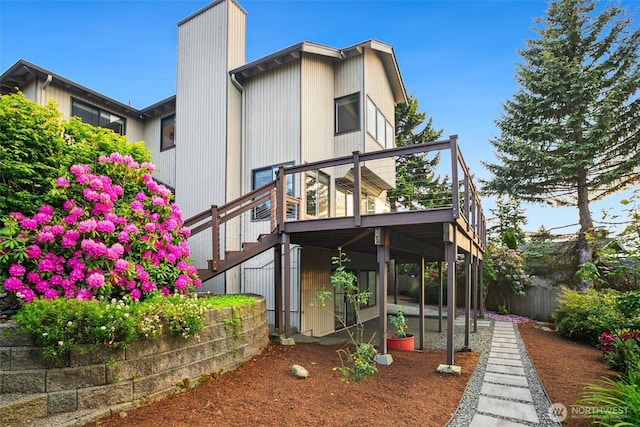 5030 155th Pl SE, Bellevue, WA 98006 - rear view of property with a wooden deck, a chimney, and stairway
