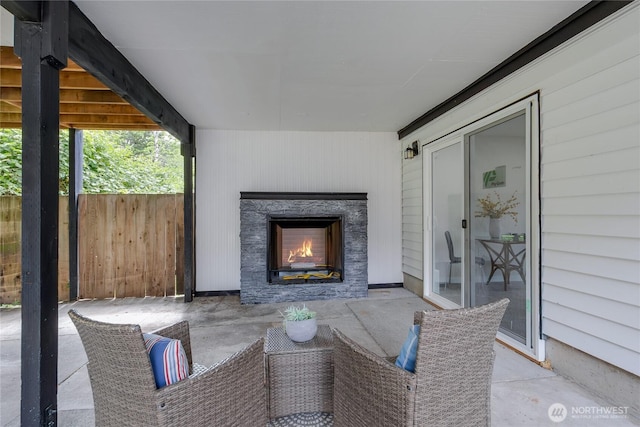 5310 26th Ave S, Seattle, WA 98108 - view of patio / terrace featuring an outdoor stone fireplace