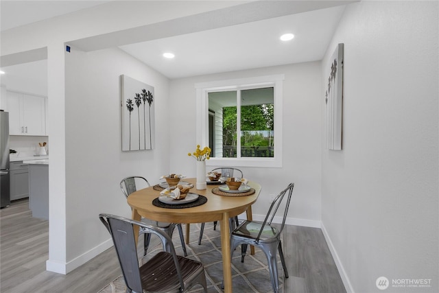 5310 26th Ave S, Seattle, WA 98108 - dining space featuring baseboards, light wood finished floors, and recessed lighting