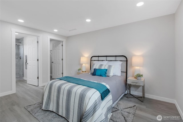 5310 26th Ave S, Seattle, WA 98108 - bedroom featuring baseboards, wood finished floors, and recessed lighting