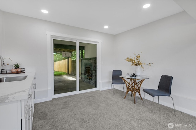 5310 26th Ave S, Seattle, WA 98108 - living area with light colored carpet, baseboards, and recessed lighting