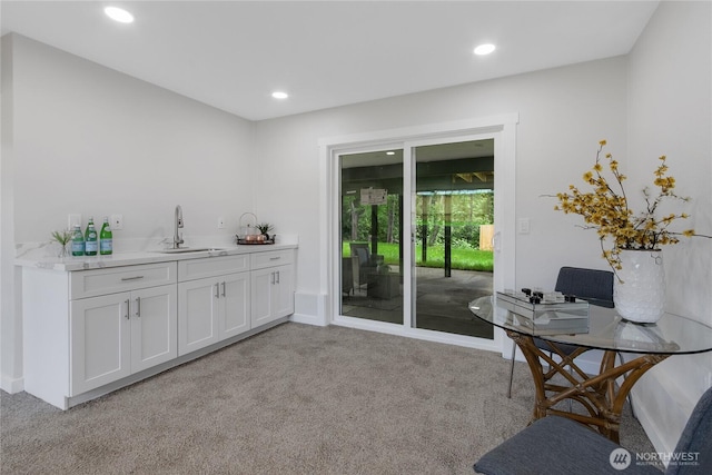 5310 26th Ave S, Seattle, WA 98108 - office area with light carpet, a sink, recessed lighting, and baseboards
