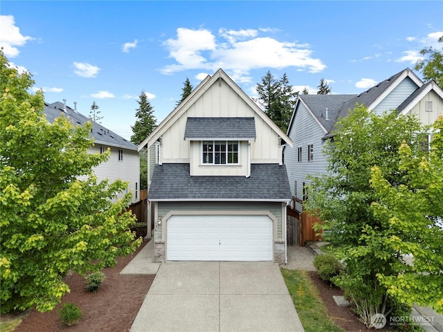 12611 13th Ave SE, Everett, WA 98208 - view of front of home with board and batten siding, brick siding, roof with shingles, and driveway