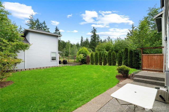 12611 13th Ave SE, Everett, WA 98208 - view of green lawn with a patio area