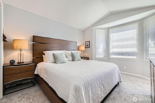 800 96th Ave NE Unit G201, Lake Stevens, WA 98258 - carpeted bedroom featuring vaulted ceiling and baseboards
