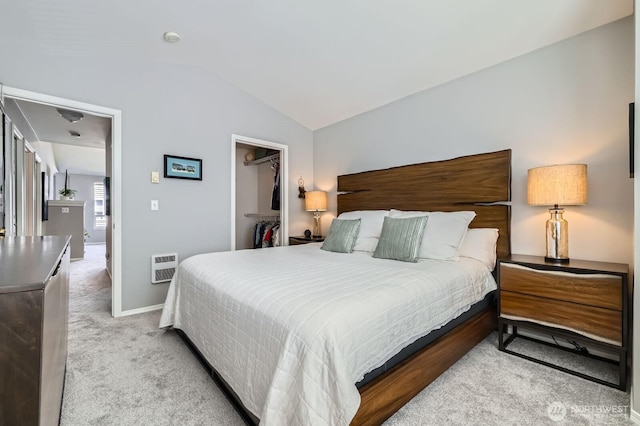 800 96th Ave NE Unit G201, Lake Stevens, WA 98258 - bedroom featuring lofted ceiling, light colored carpet, a spacious closet, heating unit, and baseboards