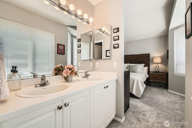 800 96th Ave NE Unit G201, Lake Stevens, WA 98258 - ensuite bathroom with double vanity and baseboards
