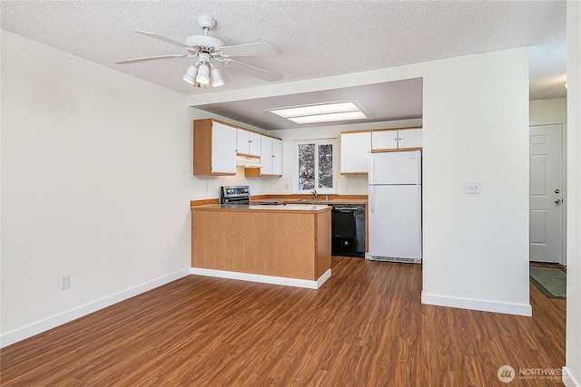 8823 Holly Dr Unit H207, Everett, WA 98208 - kitchen with freestanding refrigerator, black dishwasher, range, a sink, and under cabinet range hood