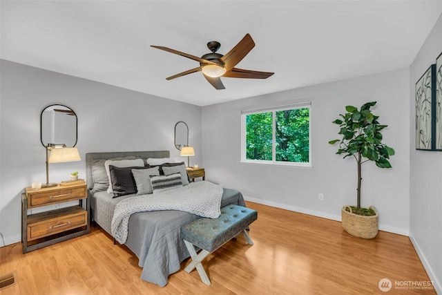10704 25th Pl NE, Lake Stevens, WA 98258 - bedroom with light wood finished floors, baseboards, and a ceiling fan