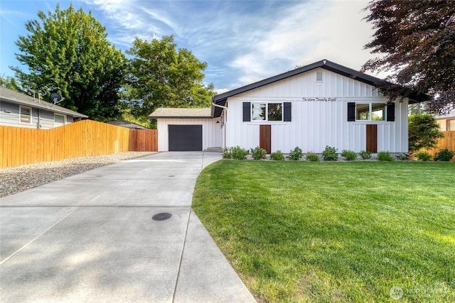 1328 Dakota St, Walla Walla, WA 99362 - modern farmhouse featuring concrete driveway, a garage, and board and batten siding
