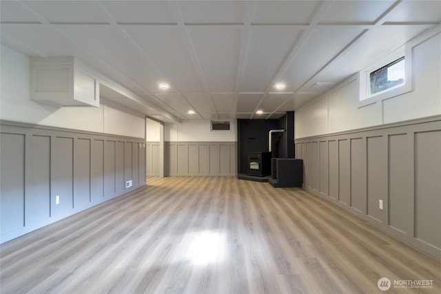 1328 Dakota St, Walla Walla, WA 99362 - basement featuring a decorative wall, light wood-style flooring, recessed lighting, and wainscoting