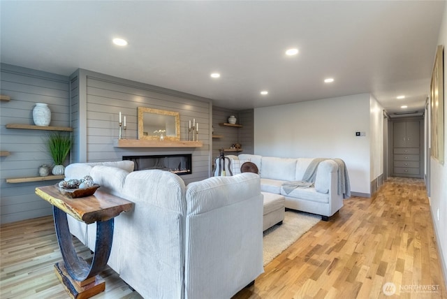 1328 Dakota St, Walla Walla, WA 99362 - living room featuring light wood finished floors, wooden walls, recessed lighting, and baseboards