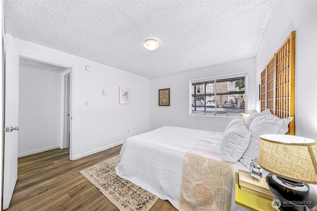 1338 Orleans St, Bellingham, WA 98229 - bedroom featuring wood finished floors, a textured ceiling, and baseboards