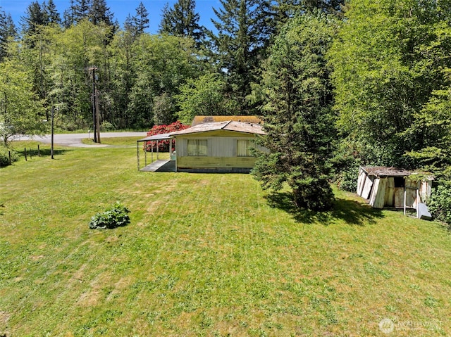4213 SE Salmonberry Rd, Port Orchard, WA 98366 - view of grassy yard with a carport