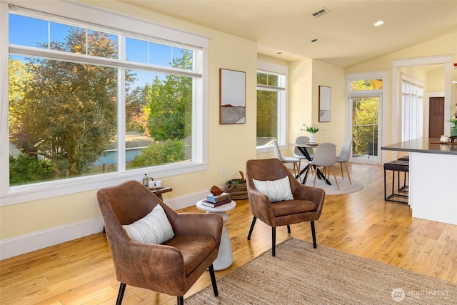 11744 NE Sand Point Way, Seattle, WA 98125 - sitting room with hardwood / wood-style flooring, baseboards, recessed lighting, and lofted ceiling