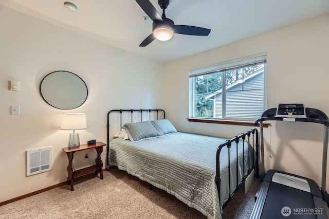 10829 19th Ave SE Unit 3C, Everett, WA 98208 - carpeted bedroom featuring baseboards, heating unit, and a ceiling fan