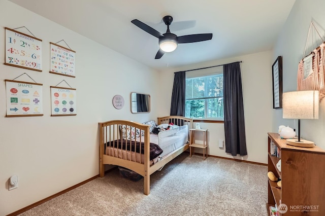 10829 19th Ave SE Unit 3C, Everett, WA 98208 - bedroom with carpet floors, baseboards, and a ceiling fan
