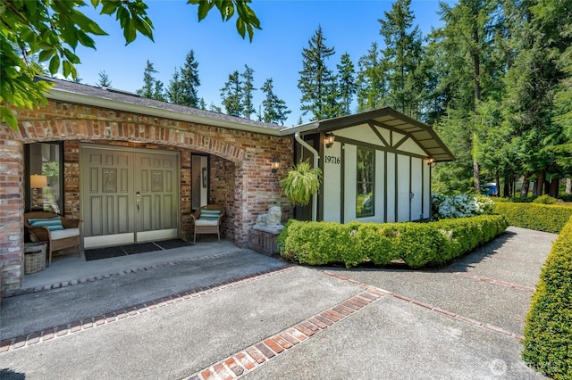 19716 61st Ave SE, Snohomish, WA 98296 - entrance to property with brick siding and a porch