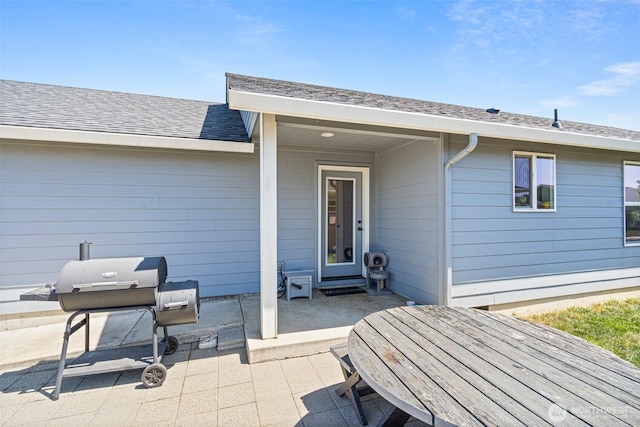 505 Herren Ave, Winlock, WA 98596 - doorway to property with a patio and roof with shingles