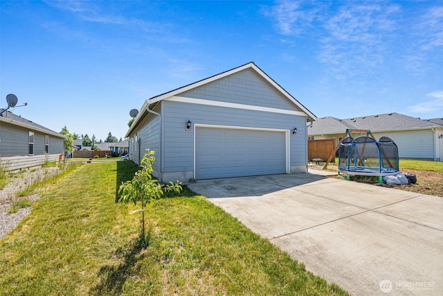 505 Herren Ave, Winlock, WA 98596 - view of front of home featuring a trampoline and a garage