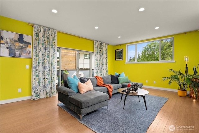 4531 S Kenny St, Seattle, WA 98118 - living area featuring baseboards, wood finished floors, recessed lighting, and plenty of natural light