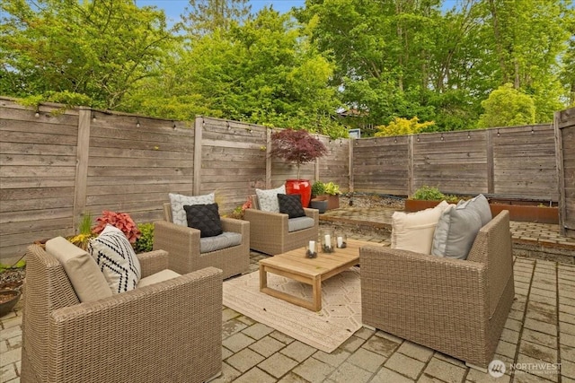 4531 S Kenny St, Seattle, WA 98118 - fenced backyard with a patio area and outdoor lounge area