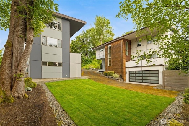 4531 S Kenny St, Seattle, WA 98118 - view of grassy yard featuring a garage