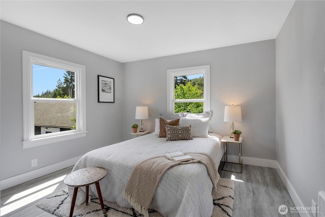 4224 Division Ave W, Bremerton, WA 98312 - bedroom with baseboards and wood finished floors
