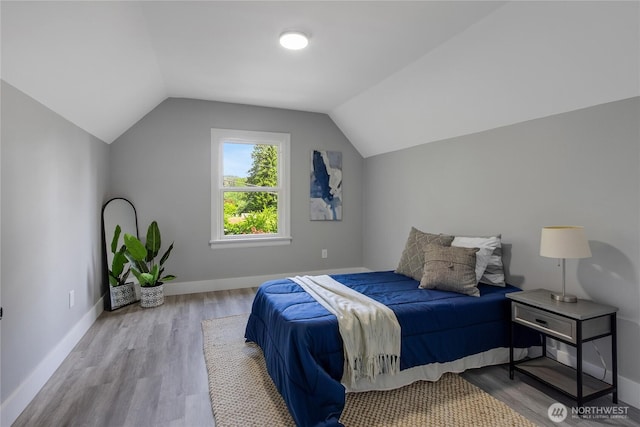 4224 Division Ave W, Bremerton, WA 98312 - bedroom with wood finished floors, lofted ceiling, and baseboards