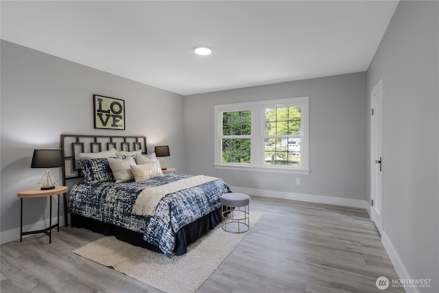 4224 Division Ave W, Bremerton, WA 98312 - bedroom featuring baseboards and wood finished floors