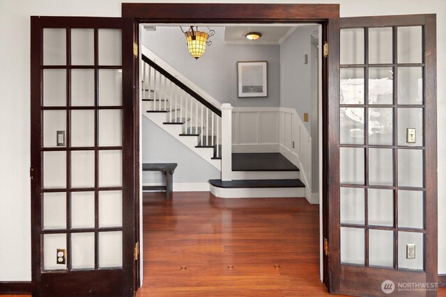 3201 SW Genesee St, Seattle, WA 98126 - entryway featuring ornamental molding, stairway, wood finished floors, and baseboards