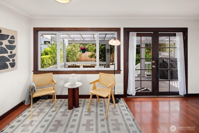 3201 SW Genesee St, Seattle, WA 98126 - sitting room with french doors, wood finished floors, baseboards, and ornamental molding