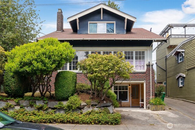 410 N 48th St, Seattle, WA 98103 - view of front of house featuring a chimney and brick siding