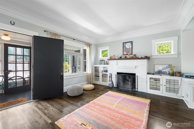 410 N 48th St, Seattle, WA 98103 - living room with crown molding, wood finished floors, a brick fireplace, and french doors