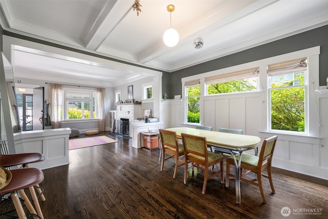 410 N 48th St, Seattle, WA 98103 - dining room featuring a fireplace, ornamental molding, a decorative wall, dark wood-style floors, and beam ceiling