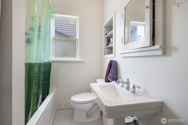 410 N 48th St, Seattle, WA 98103 - bathroom with toilet, shower / tub combo with curtain, and tile patterned flooring