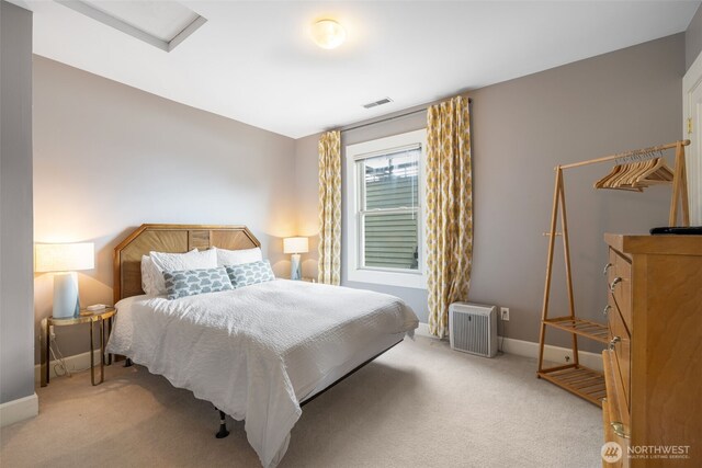 410 N 48th St, Seattle, WA 98103 - bedroom featuring attic access, light carpet, and baseboards