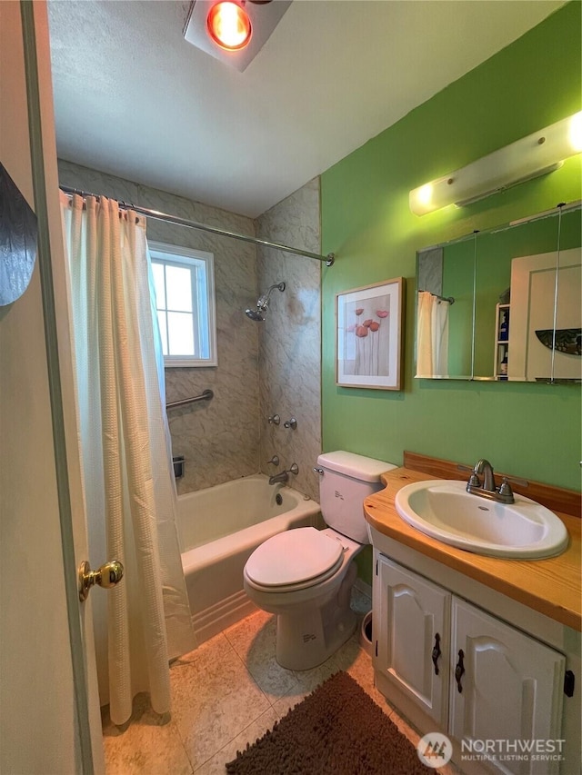 30 Hemlock St N, Soap Lake, WA 98851 - full bathroom featuring toilet, shower / bath combo with shower curtain, vanity, and tile patterned flooring