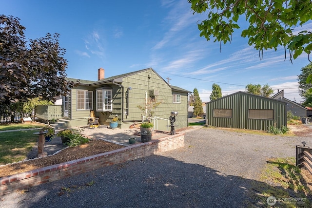 30 Hemlock St N, Soap Lake, WA 98851 - view of home's exterior featuring a chimney