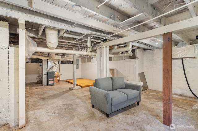 4035 A St, Tacoma, WA 98418 - unfinished below grade area featuring electric panel and heating unit