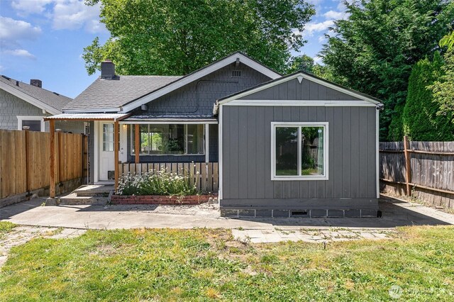 4035 A St, Tacoma, WA 98418 - view of front facade with a chimney, roof with shingles, and covered porch